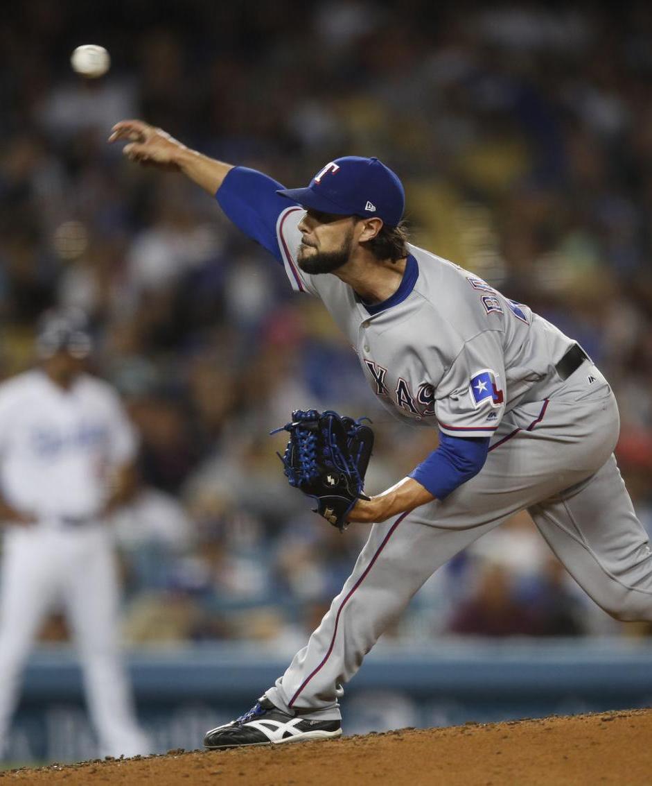 Texas Rangers relief pitcher Tony Barnette delivers during the sixth inning of a June 12 game against the Dodgers in Los Angeles.-Jae C. Hong/Associated Press