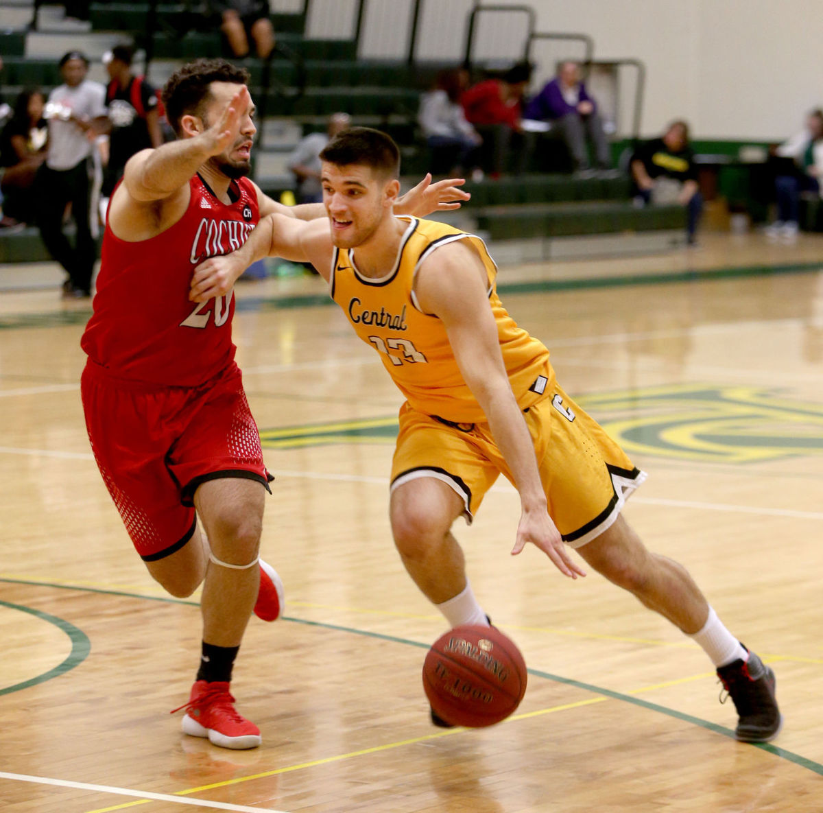 Central Arizona College’s Mattia Cafisi, right, drives against Cochise’s Bryan Urrutia during Wednesday night’s game at the George Young Activity Center.
Oscar Perez/PinalCentral
