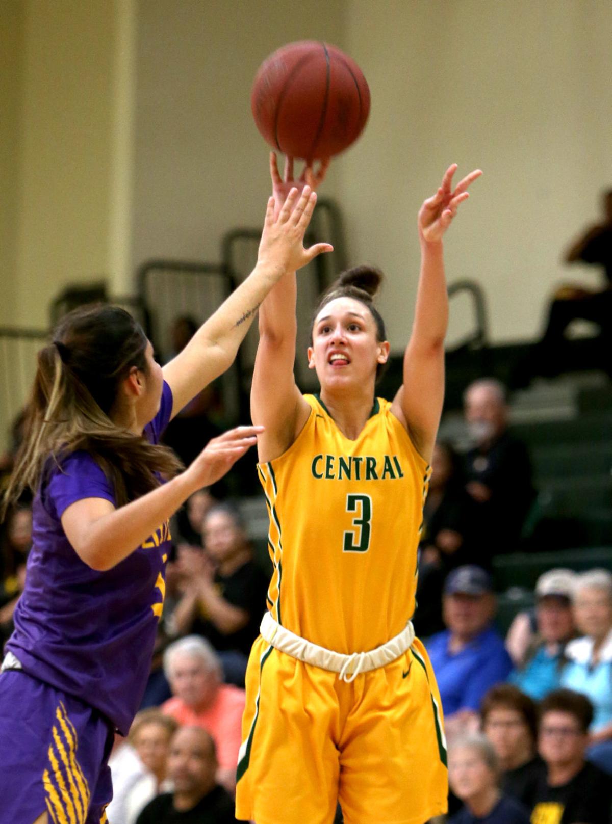 All ACCAC player Megan Guadian shoots from 3 point range in play-off win against Eastern Arizona
