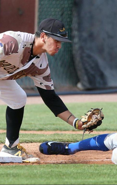 Ernny Ordonez tags out attempted base stealer. Doubles in Game 2 Saturday