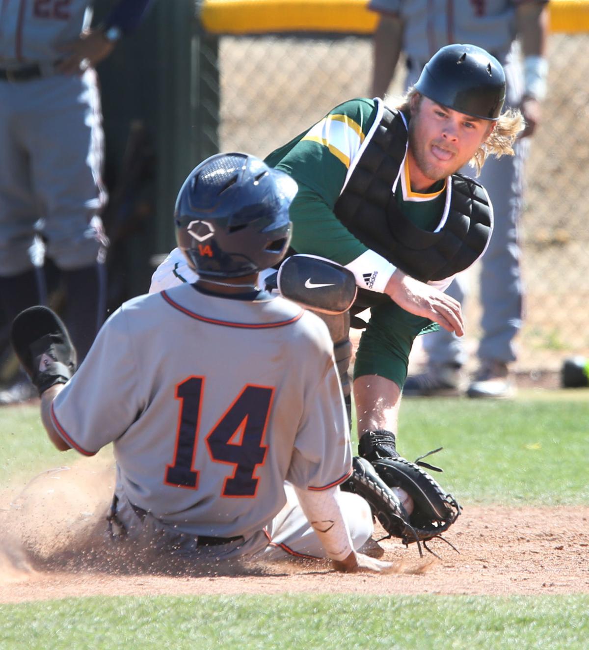 Seth Beckstead, CAC catcher, with the tag in 2020 game. He tripled and homered in game one in Yuma Saturday.