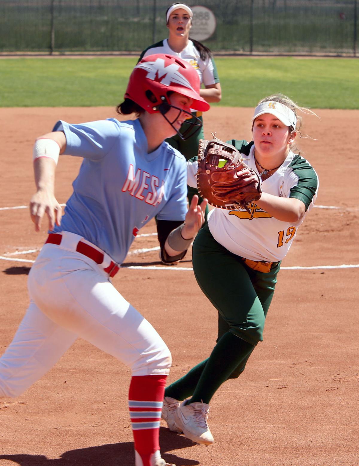 Evelyn Roman with the tag-out at first base Saturday against MCC