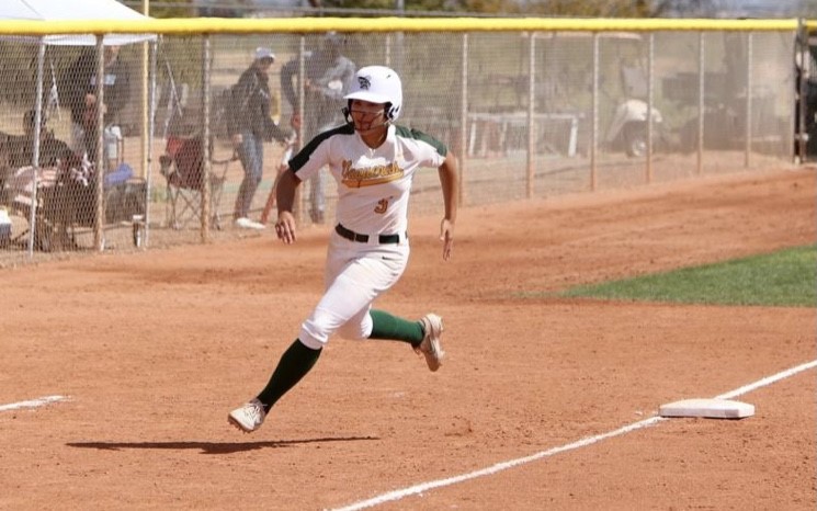 Ana Rodriguez rounds third. Photo by Maria Vasquez of Pinal Central