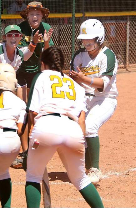 Evelyn Roman happily tags homeplate in a Vaqueras win last year.